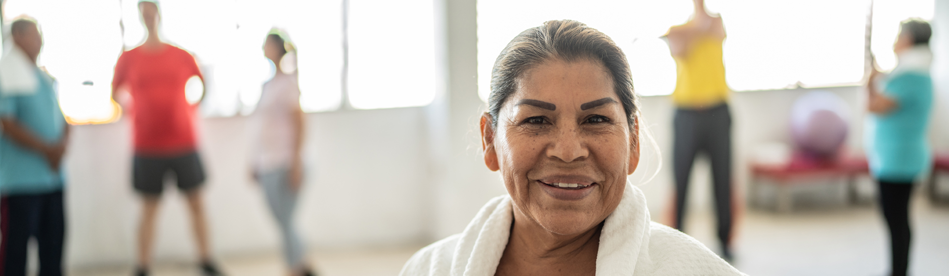 Woman smiling at workout class